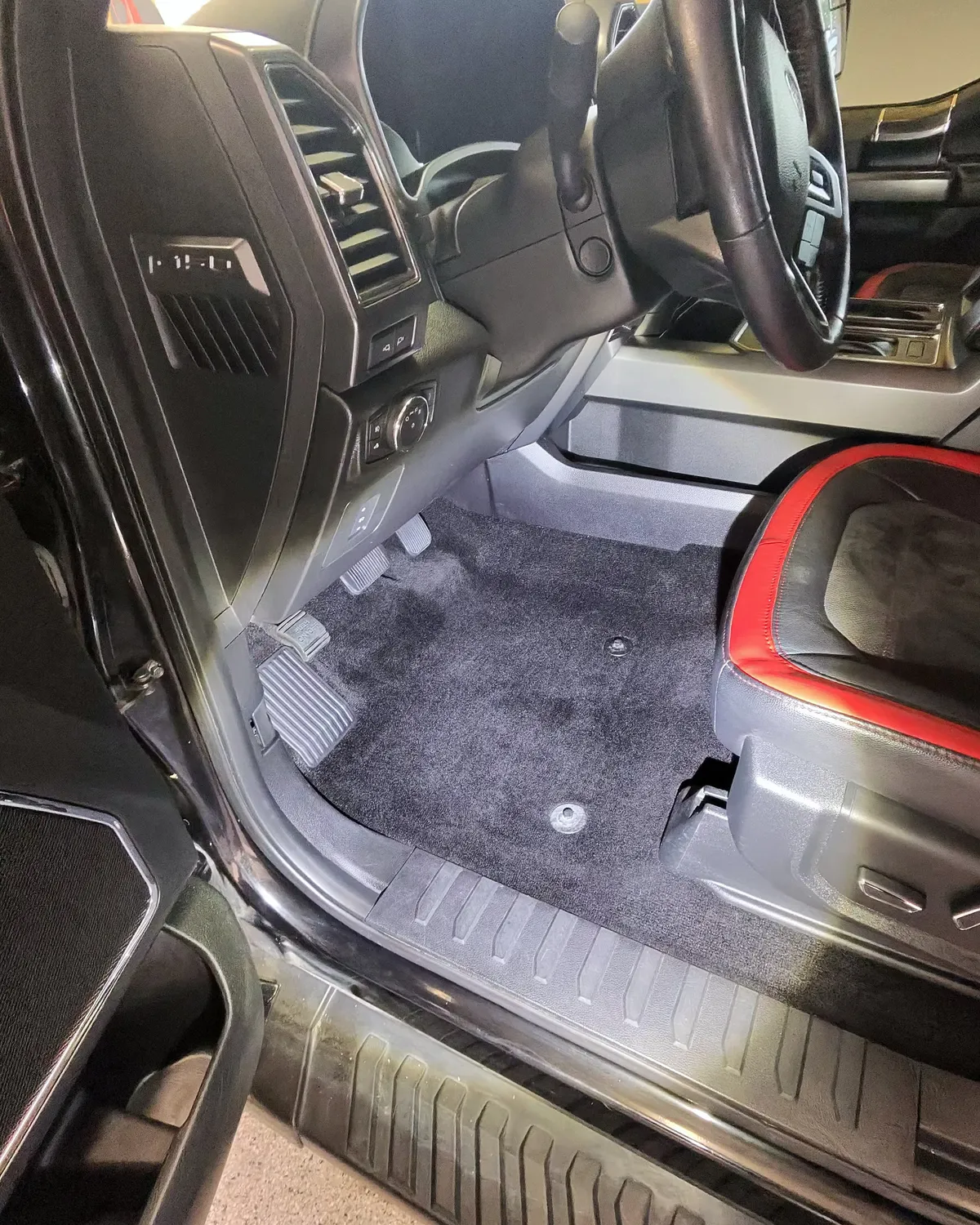 Ford F-150 driver floor after pet hair removal and extraction